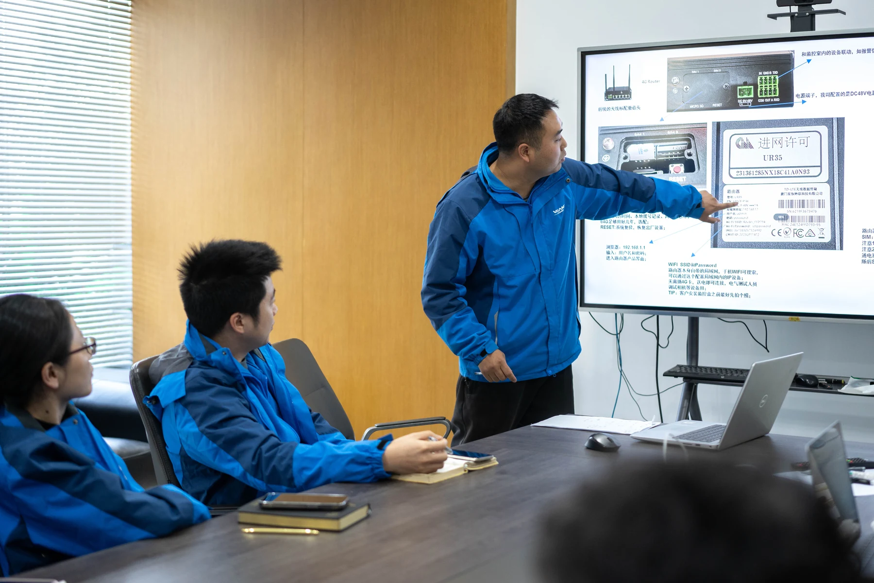 Valiant Power team in an equipment discussion