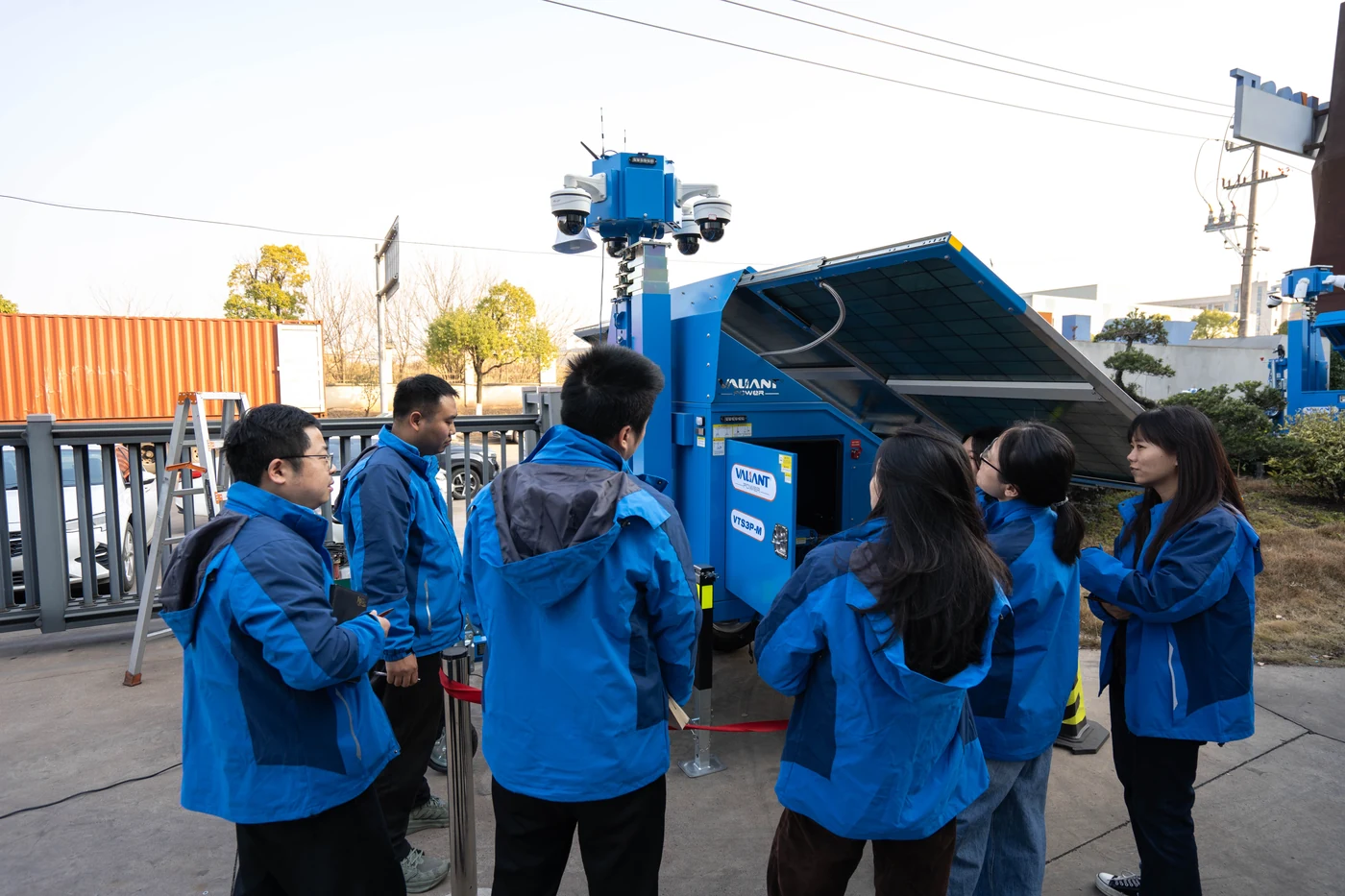 Team discussing a surveillance unit