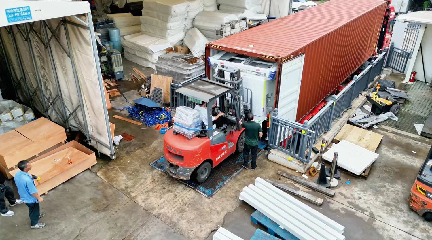Equipment handling beside shipping containers